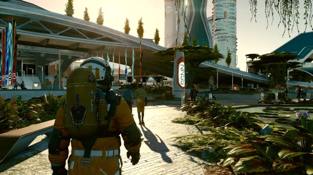 Ein Astronaut geht durch eine futuristische Stadt. 
